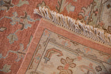 Ivory fringe and original side cord of the Mahal carpet, showcasing its hand woven reverse.