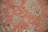 Traditional Indian Mahal rug detail: dusty rose field with blue and seafoam palmettes.