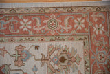 Mahal design rug corner with pale terracotta border and ivory field, oversized palmettes.