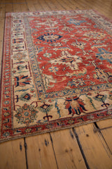 Intact side cord selvage and geometric Kazak-inspired border on a Pakistani rug.