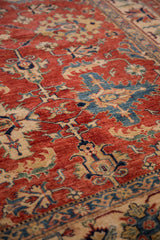 Fine wool pile with detailed geometric palmette motifs in sapphire blue and cherry red.