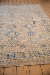Fine wool geometric blue patterns and soothing abrashes on a Caucasian design rug.