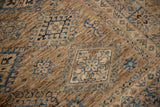 Fine weave wool pile showing geometric diamond motifs in antique ivory and powder blue.