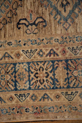 Detailed geometric weave on a Caucasian design rug with tone-on-tone navy blue and beige.