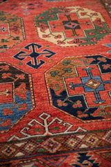 Ersari design rug's red geometric border with intricate diamond and tribal motifs.