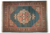 Vintage Serapi Indian Soumac rug: oversize medallion, dusty teal field, terra cotta border.