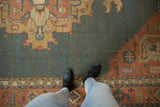 Vintage Serapi Indian Soumac carpet, abrashed dusty teal ground, geometric floral border.