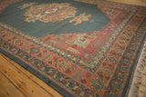 Vintage Serapi carpet corner, terra cotta border showing serrated leaf and geometric florals.