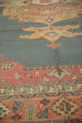 Serrated leaf and geometric floral border motifs in terra cotta, dusty teal, and gold.