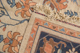 Hand-woven vintage Soumac design carpet corner, navy and terra cotta border, antique ivory fringe.