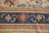 Indian Soumac carpet border with navy blue, terra cotta, ivory floral motifs, and original selvage.