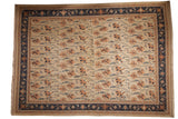 Vintage Indian Soumac rug, allover Serapi design with ivory field and navy blue floral border.