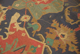 Vintage Indian Soumac rug detail featuring deep blue, madder red, and teal geometric arabesques.