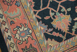 Dusty navy vinery and blush palmette motifs on a hand-woven Indian Soumac border.