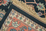 Vintage Soumac rug corner, creamy fringe, dusty navy border, and blush vinery palmettes.
