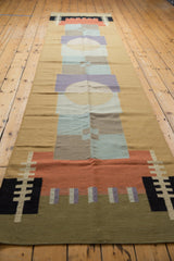 Contemporary Kilim runner: abstract geometric shapes in sand, madder root red, and blue.