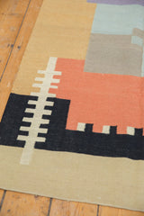 Sand, jet black, and beige geometric design with intact selvage on the Vintage Kilim runner.
