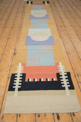 Secured beige end and black geometric border design on the hand woven contemporary kilim rug.