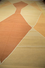 Hand-woven kilim texture with rust, beige, and ivory argyle diamond pattern.