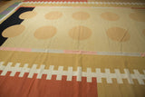 White geometric ladder pattern on madder root and beige flat-woven Kilim border.