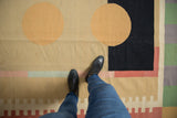 1980s Contemporary Kilim rug with madder root red circles and multicolor banded border.