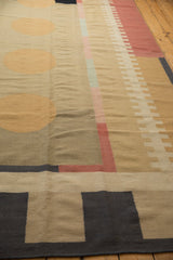 Abstract charcoal and beige block pattern on vintage contemporary kilim corner.