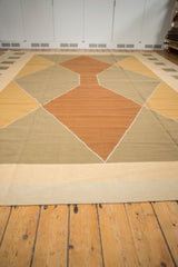 Modern flatweave Kilim carpet edge showing sand and dusty ivory colors.
