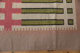 Contemporary Kilim runner bottom: geometric pale raspberry, green blocks and reciprocating mauve border.