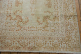 Vintage Bulgarian Kerman rug corner with short fringe and rococo stylized border.