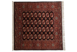 Vintage hand-knotted Pakistani Bokhara square rug, charcoal, terra cotta, ivory gul medallions, 6x6.