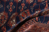 Soft, silk-like texture of the dense wool pile on a vintage Bokhara carpet.