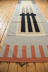 Contemporary Kilim runner with madder root red geometric bars and slate flatweave.