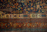 Vintage Indian Shiraz carpet border and field, full pile with stylized birds, plants, and cypress motifs.