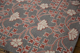 Close-up view of the raised hand-knotted pile and flatweave texture of the Samarkand design carpet.