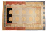 Vintage Contemporary Kilim carpet, abstract geometric circles and rectangles in ivory, black, and muted tones.