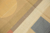 Abstract contemporary Kilim with tone-on-tone beige circles and banded blue sections.