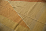 Kilim texture with modern argyle pattern in dusty terracotta and gold.