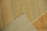 Hand woven vintage Kilim corner detail, showing secure side selvage and neutral flatweave texture.