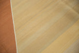 Contemporary Kilim carpet featuring modern diagonal copper, ivory, and sand stripes.