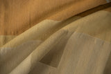 Hand woven kilim textile detail, modern style with sand, ivory, and gold tones.