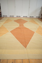 Modern Argyle diamond pattern on hand woven Kilim in ivory, beige, and copper.