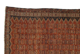 Serrated navy and ivory borders surround the brick red geometric field of this antique Malayer.