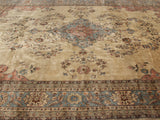 Ivory field with slate blue and dusty rose floral sprays, and Tabriz design border.