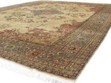 Vintage Romanian Tabriz rug corner with slate blue and dusty rose floral borders.
