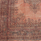 Detailed Rococo-style border of a vintage Kerman carpet with floral scrolls in blue and rose.