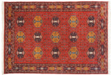 Vintage hand knotted Pakistani Caucasian rug, terra cotta field with repeating geometric floral panels.