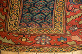 Unusual wide main border of the antique Kurdish runner with nuanced geometric design.