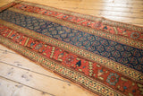 Hand knotted antique Kurdish runner, wide border, repeating navy boteh motifs.
