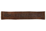 Antique Fereghan rug runner with a dense Herati motif field in navy blue, rust, and signature Fereghan green.
