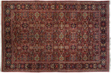 Vintage Mahal carpet with a cherry red field of interlaced floral palmettes and a navy blue border.